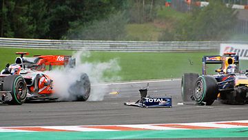 Jenson Button, Sebastian Vettel, kuva:  EPA/LUIS ARRENDONDAS 