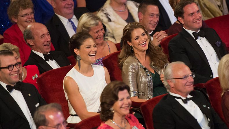 (L-R, middle row) Sweden's Prince Daniel, Crown Princess Victoria, Princess Madeleine and Mr Christopher O'Neill and in front of them Queen Silvia and King Carl Gustaf of Sweden laugh at the Swedish Riksdag's jubilee concert at the Concert Hall in Stockholm, Sweden, 14 September 2013, to celebrate the King's 40th anniversary on the throne.