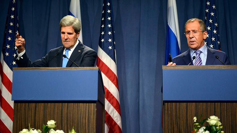 U.S. Secretary of State John Kerry (L) and Russian Foreign Minister Sergei Lavrov (R) deliver statements to the press following their meeting to discuss the Syrian conflict in Geneva, Switzerland, 12 September 2013. Kerry and Lavrov arrived in Geneva for extensive talks on how to control Syria's chemical weapons. The talks at the Intercontinental hotel are scheduled to last until 13 September, diplomats say. 