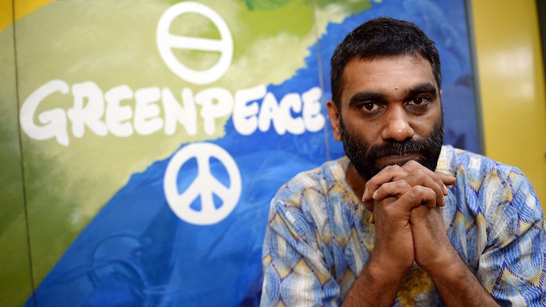 Kumi Naidoo, of south Africa and international executive director of Greenpeace, poses for a photo during an interview with AFP in Manila on June 3, 2013.