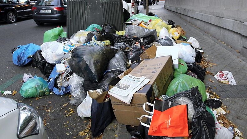 A pile of rubbish is seen on the ground in Madrid, Spain, 12 November 2013. Workers of the cleaning and gardening sector started an ongoing strike on 05 November to protest against the employment regulation plan proposed by the three contractors working for the city hall that would affect up to 1,144 workers. 