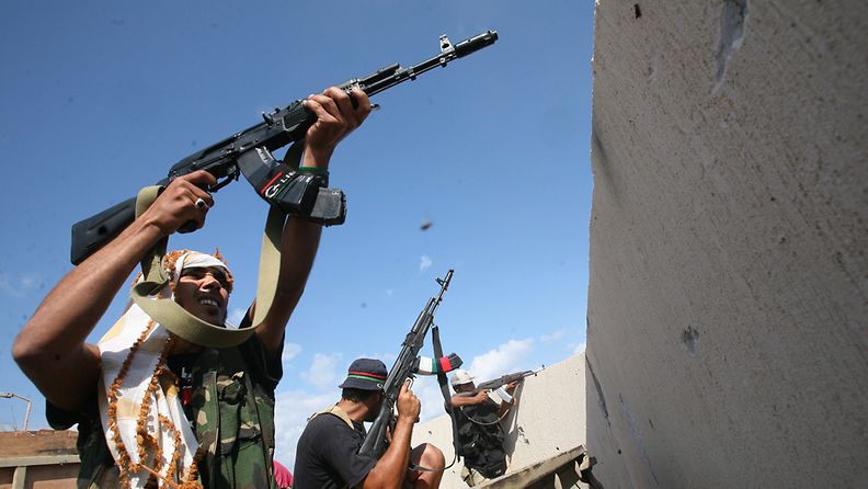 Gaddafia vastustavat joukot jatkopivat tasteluja keskiviikkona. Kuva: EPA