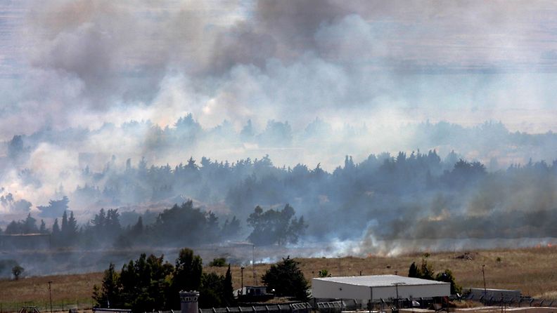 Smoke caused by shelling rises on the Syrian side of the border, next to the Israeli-Syrian border crossing of Quneitra, in the Golan Heights, Israel, 06 June 2013. 