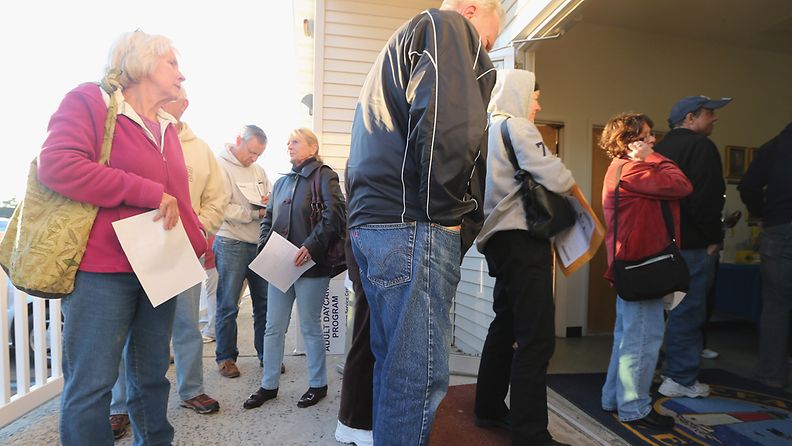MANAHAWKIN, NJ - NOVEMBER 05: Voters from areas affected by Superstorm Sandy line up to cast their ballots in the 2012 presidential election at the Southern Ocean County Resource Center on November 5, 2012 in Manahawkin, New Jersey. Many voters in areas are affected by the storm are finding challenges in casting their ballots.