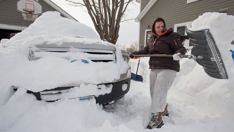 Hefty task....Katelynn Lebeau clears snow from her driveway in Hatfield, Massachusetts, USA 09 February 2013. 