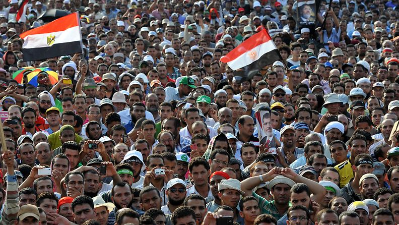 Thousands of Egyptian supporters of ousted president Mohamed Morsi take part in a protest outside Rabaa al-Adawiya mosque in Cairo, Egypt, 08 July 2013.