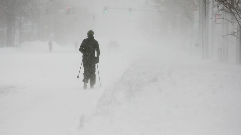 A cross-country skier makes his way up Massachusetts Avenue during winter storm Nemo in Cambridge, Massachusetts, USA, 09 February 2013