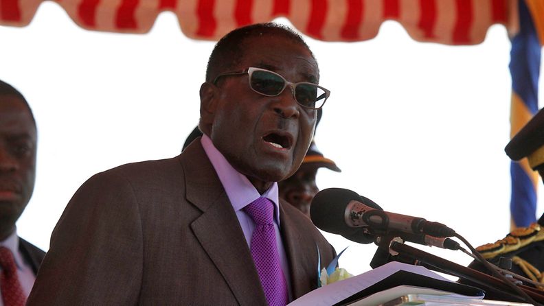  picture made available on 14 June 2013 shows Zimbabwe President Robert Mugabe speaking during a graduation ceremony of more than 300 police officers at the Morris Depot in the capital, Harare Zimbabwe, 13 June 2013.