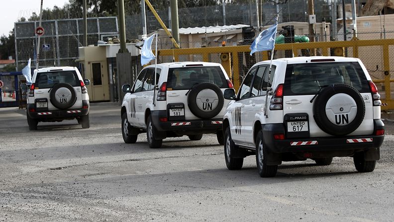 A picture made available on 06 June 2013 shows UN cars crossing the border between Israel and Syria at Quneitra crossing, the only crossing between the two countries, in the Golan Heights, 08 March 2013. 