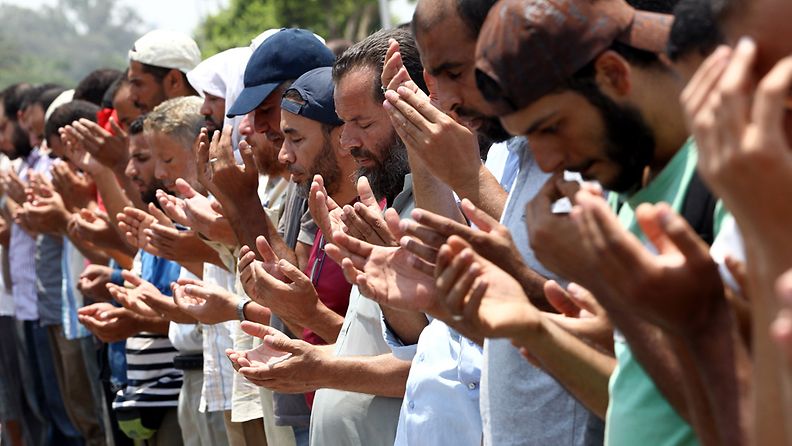 Supporters of ousted Egyptian President Mohamed Morsi perform a prayer near the headquarters of the Republican Guard, in Cairo, Egypt, 06 July 2013. Latest reports say that at least 36 have been killed in clashes between Muslim Brotherhood supporters and opposers of Mohammed Morsi. 