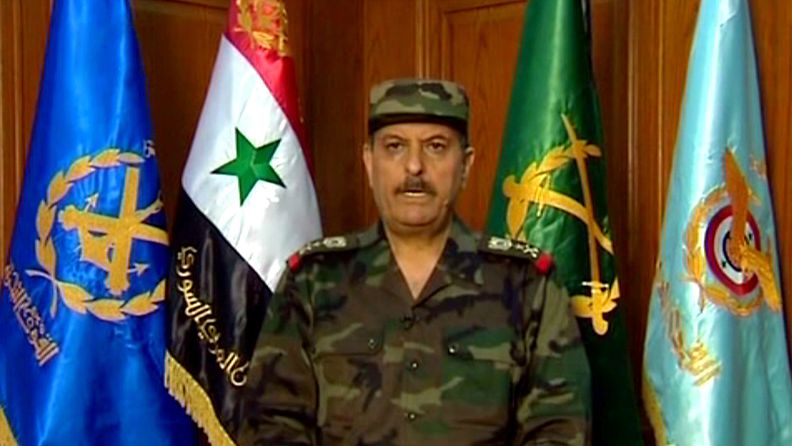 Syrian Arab News Agencyn välittämä kuvakaappaus videokuvasta, jossa vastanimitetty puolustusministeri Fahd Jassem al-Freij puhuu Damaskoksessa 18.7.2012.