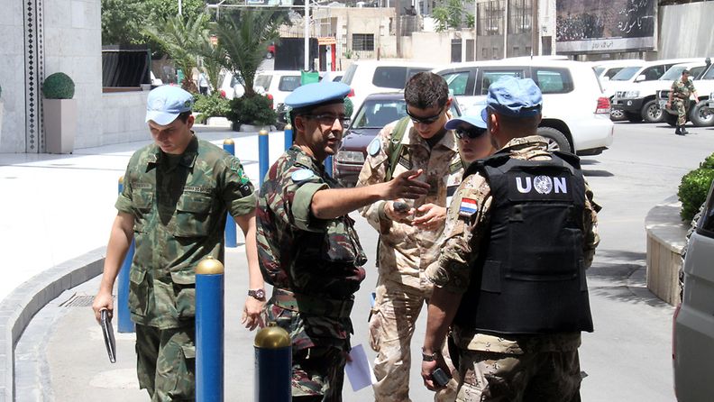 YK:n tarkkailijoita Damaskoksessa Syyriassa 16. heinäkuuta 2012.