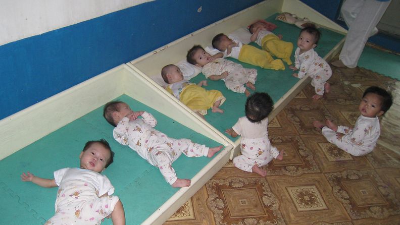 An undated handout picture provided by the Korean Council for Reconciliation and Cooperation (KCRC) on 09 August 2011 of babies at an orphanage in the western North Korean county of Sariwon, Hwanghae Province. A seven-member delegation from the Korean Council for Reconciliation and Cooperation (KCRC), a South Korean civic organization for unification, took the photo during their visit to Sariwon from 3-6 August 2011 to monitor the distribution of 300 tons of flour aid they had sent to the flood-damaged county earlier. 