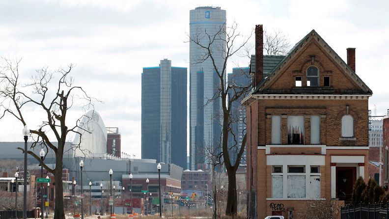 March 2013 an empty house with the GM Building in downtown Detroit in the background is seen in Detroit, Michigan, USA. The city of Detroit filed for Chapter 9 bankruptcy protection according to an official 18 July 2013. 