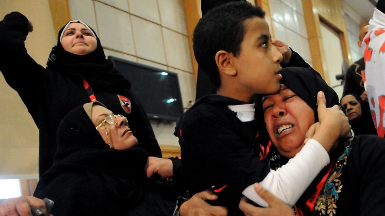 Relatives of some of victims killed during the Port Said soccer game react after the verdict of the court, at a court house in Cairo, Egypt, 26 January 2013. An Egyptian court sentenced 21 people to death on 26 January for their role in the country’s worst football tragedy last year, in which dozens were killed. Seventy-four people died in the Port Said stadium when riots broke out between rival fans of the hosts al-Masry and the visiting team al-Ahly following a Premier League match in February 2012. EPA/AHMED SADA                     
