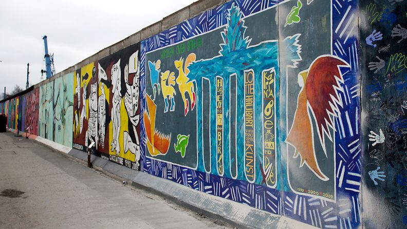 Berliinin muurin graffitit halutaan säilyttää ainutlaatuisena muistomerkkinä.