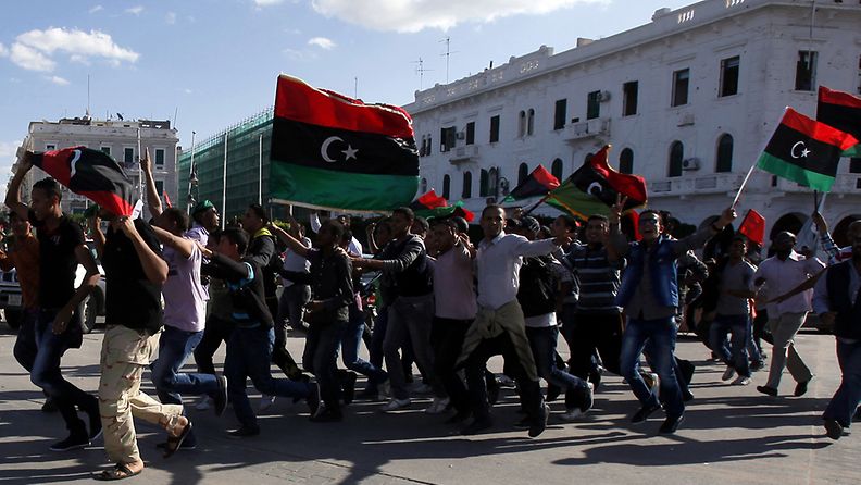 Tripolin kaduilla juhlittiin Muammar Gaddafin pojan pidätystä 19.11.2011.