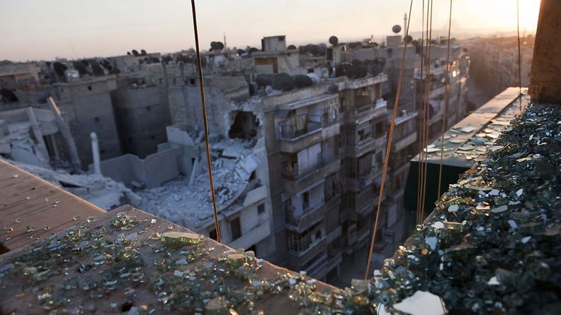 Photo made available on 15 October shows partially destroyed buildings due to Syrian Army artillery shelling and bombing in Aleppo, Syria, 13 October 2012.