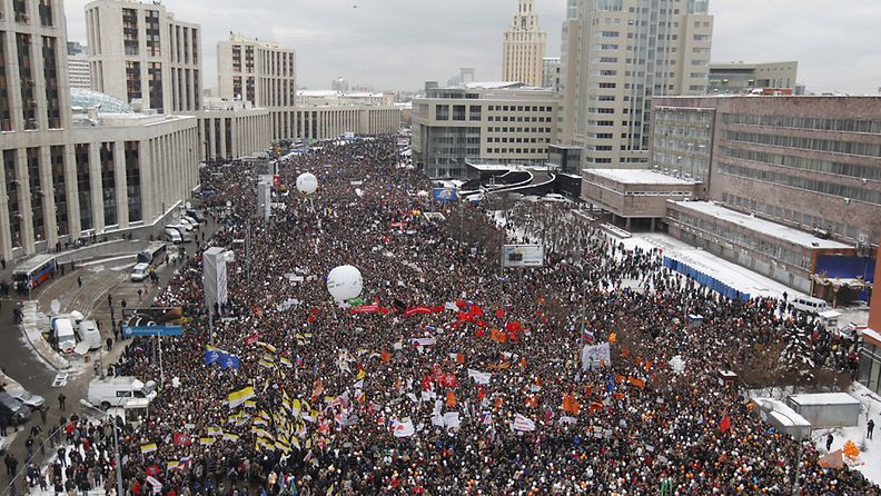 Demonstrators take part in a mass rally in Moscow, Russia, 24 December 2012. Tens of thousands of demonstrators rallied in cities across Russia to protest alleged vote fraud in recent parliamentary elections and to call for the removal of the officials responsible. The Moscow demonstration was peaceful, with almost no conflict between the demonstrators and police.