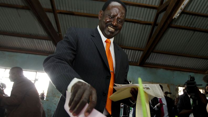 Kenya's Prime Minister and presidential aspirant Raila Odinga casts his vote at a polling station in the Kibera slum, Nairobi, Kenya, 04 March 2013. Millions of Kenyans started voting for the general elections on 04 March 2013. EPA/DAI KUROKAWA                     