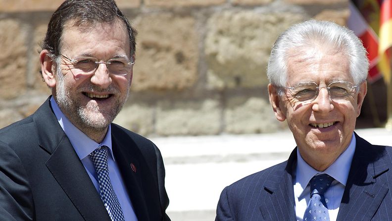 Espanjan ja Italian pääministerit Mariano Rajoy (vas.) ja Mario Monti kuvattuna 22.6.2012.