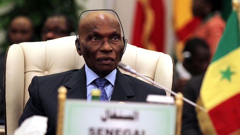 Senagal President Abdoulaye Wade looks on during a session of the Africa/EU summit in Tripoli, Libya, 29 November 2010. The Africa/EU Summit is due to take place in Libya on 29 and 30 November under the theme of Investment, Economic Growth and Job Creation . Heads of States and Governments are to address key issues, as peace and security, climate change, regional integration and private sector development, infrastructure and energy, agriculture and food security, migration. 