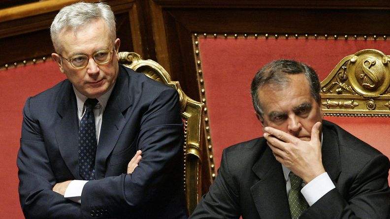 Italian Economy Minister, Giulio Tremonti sits arms folded next to Minister for Simplication Rules Roberto Calderoli during the debate in the Senate, Rome 14 July 2011 ahead of the vote on a tough austerity budget which proposes cuts of 48 billion euros over three years.