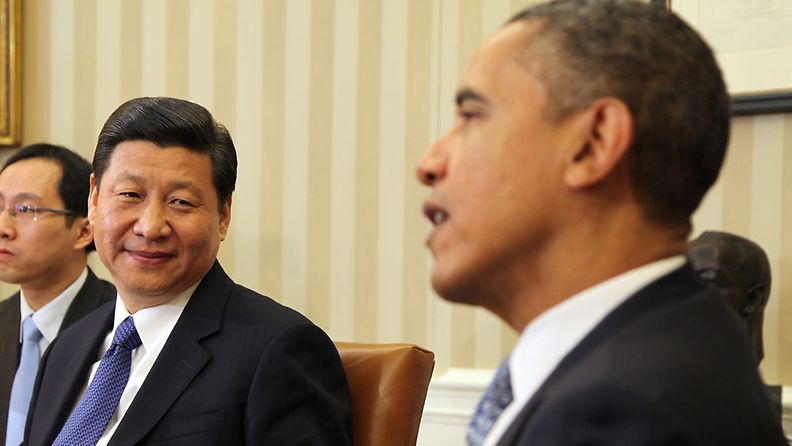 US President Barack Obama (right) meets with Vice President Xi Jinping of the People's Republic of China in the Oval Office of the White House, Washington, DC, Feb. 14, 2012.                 