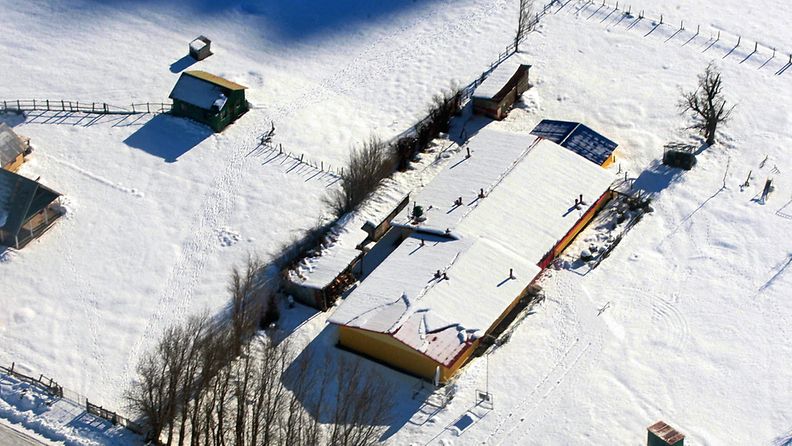 Lumen saartamia taloja Coyhaiquessa, Chilessä. 