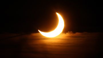 Aurinko peitti kuun Dinslakenissa Saksassa 4.1.2011. Kuva: Getty images