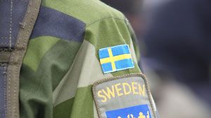 Ruotsalaisten joukkojen hihatunnus EU:n nopean toiminnan joukkojen Pohjoismaisen taisteluosaston harjoituksissa. Kuva: Lehtikuva