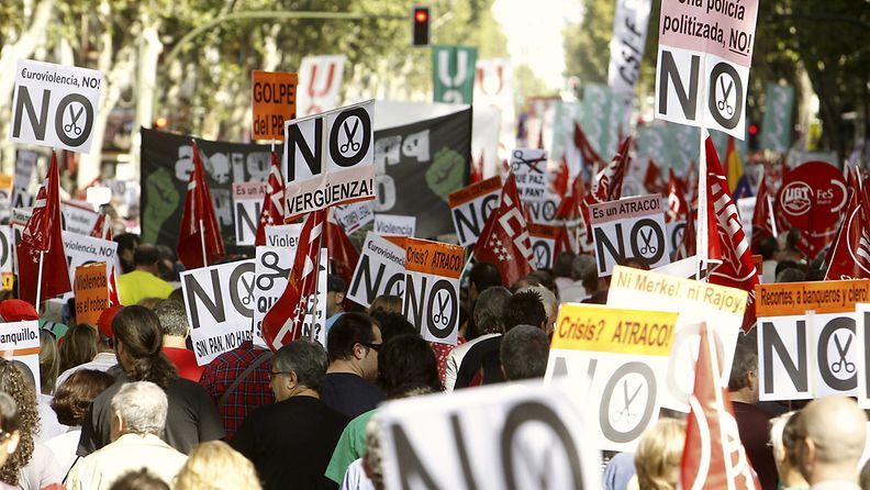 People gather during a protest against the Government's austerity measures and the 2013 National Budget, in Madrid, Spain 07 October 2012