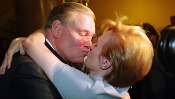 20030316 - HELSINKI, FINLAND: Prime Minister, Chairman of the Social Democratic party Paavo Lipponen gets a hug from his wife Paivi in the election wake in Helsinki March 16. Social Democrats captured 24.5 percent of the vote.