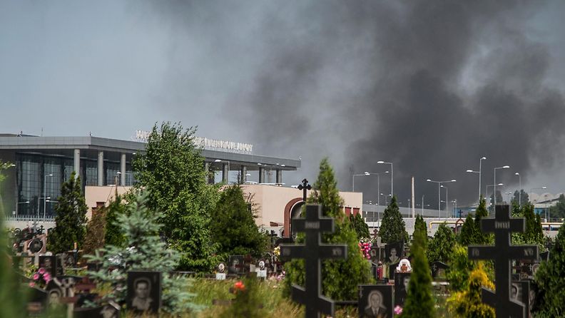 ukraina kriisi sota taistelu Donetskin lentokentältä nousi savua toukokuussa 2014, kun Venäjä-mieliset kapinalliset taistelivat Ukrainan armeijan joukkoja vastaan