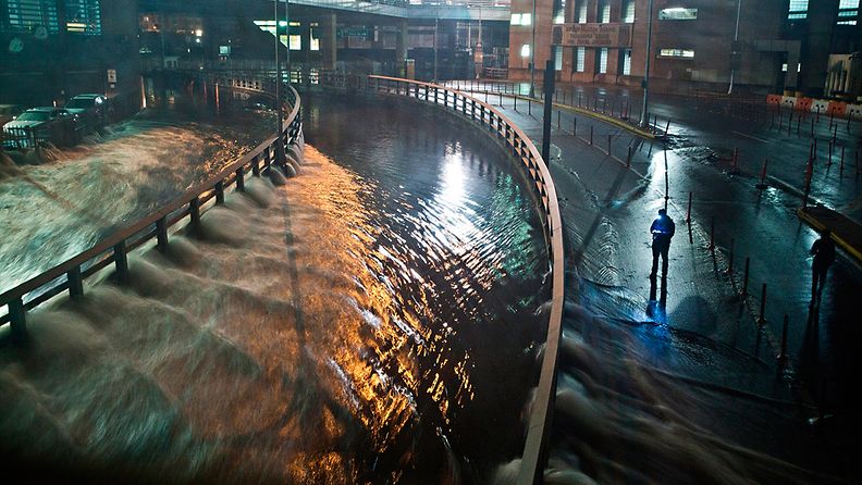 NEW YORK, NY - OCTOBER 29: Water rushes into the Carey Tunnel (previously the Brooklyn Battery Tunnel), caused by Hurricane Sandy, October 29, 2012, in the Financial District of New York, United States. Hurricane Sandy, which threatens 50 million people in the eastern third of the U.S., is expected to bring days of rain, high winds and possibly heavy snow. New York Governor Andrew Cuomo announced the closure of all New York City will bus, subway and commuter rail service as of Sunday evening (Photo by Andrew Burton/Getty Images) 