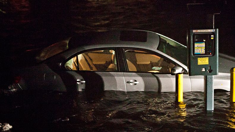 NEW YORK, NY - OCTOBER 29: Flooded cars, caused by Hurricane Sandy, are seen on October 29, 2012, in the Financial District of New York, United States. Hurricane Sandy, which threatens 50 million people in the eastern third of the U.S., is expected to bring days of rain, high winds and possibly heavy snow. New York Governor Andrew Cuomo announced the closure of all New York City will bus, subway and commuter rail service as of Sunday evening (Photo by Andrew Burton/Getty Images) 