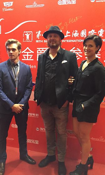 Lauri Tilkanen, Antti J. Jokinen ja Krista Kosonen Shanghain elokuvajuhlilla 16.6.2015.