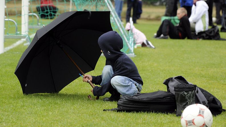 Lapsi ja sateenvarjo