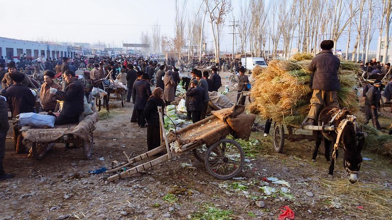 uiguureja Kashgarin kylässä Kiinassa 2016