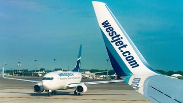Westjet Boeing passenger planes, Pierre Elliott Trudeau Airport, Montreal, Quebec, Canada - 13 Jun 2017