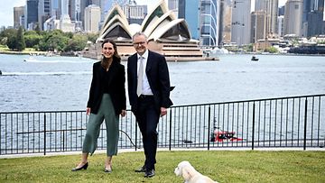 Finland Prime Minister Sanna Marin (L) poses with Australia Prime Minister Anthony Albanese and his dog Toto during a visit at Kirribilli House, in Sydney, Australia, 02 December 2022. 