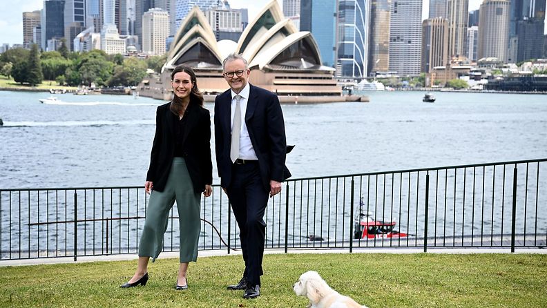 Finland Prime Minister Sanna Marin (L) poses with Australia Prime Minister Anthony Albanese and his dog Toto during a visit at Kirribilli House, in Sydney, Australia, 02 December 2022. 