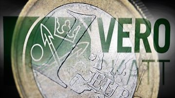 Vero-logo ja Euron kolikko.