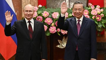 Venäjän presidentti Vladimir Putin ja Vietnamin presidentti To Lam.